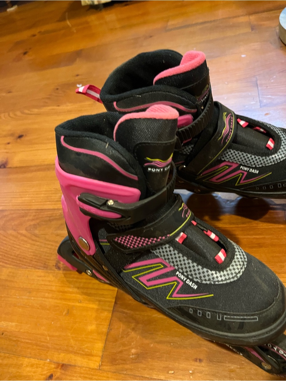 Black and Pink Adjustable Inline Skates (women size 7-9)